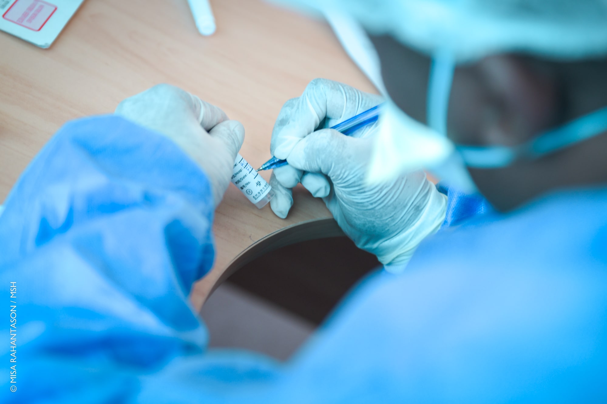 A health worker administers a COVID-19 test in Antananarivo, Madagascar. Photo by Misa Rahantason.
